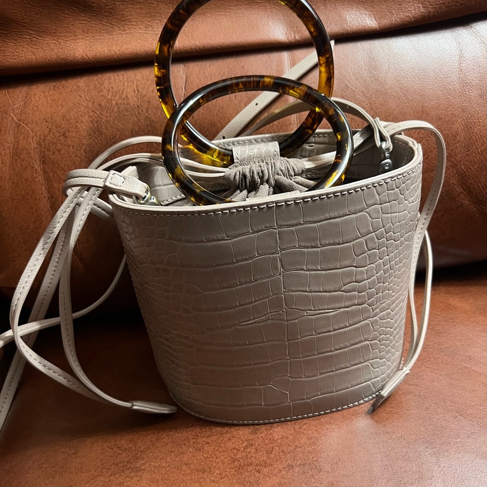 Women’s Beige Crossbody Pull String Closure Purse/Handbag Croc inspired Shell.